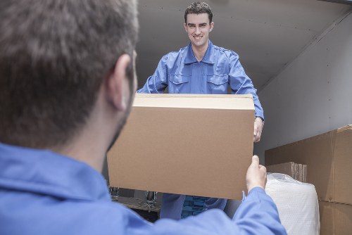 Local man with a van loading items in Parsons Green