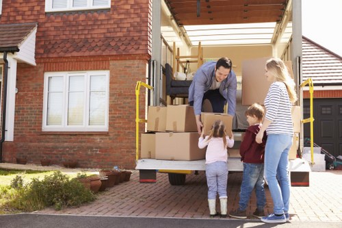 Student removals team handling boxes in Parsons Green