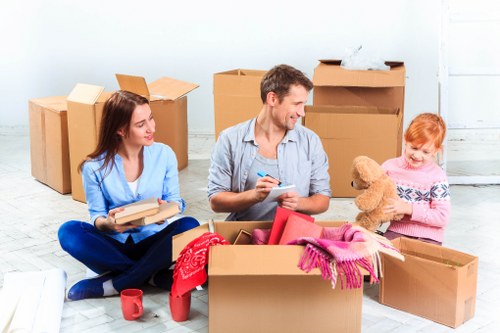 Furniture removals team preparing items for a move in Parsons Green