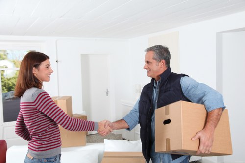 Careful loading of household furniture into a removal vehicle