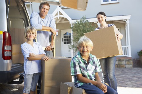Loading furniture into a hired removal truck near Parsons Green