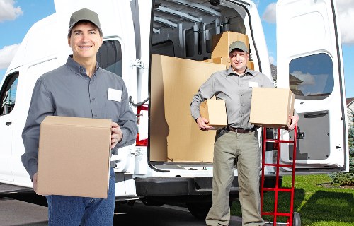 Local furniture pick-up service removing bulky household items from a flat