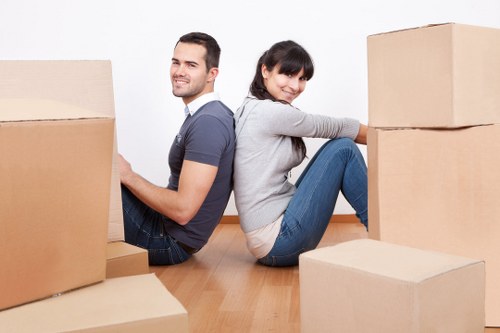 Local removal van loading furniture in Parsons Green