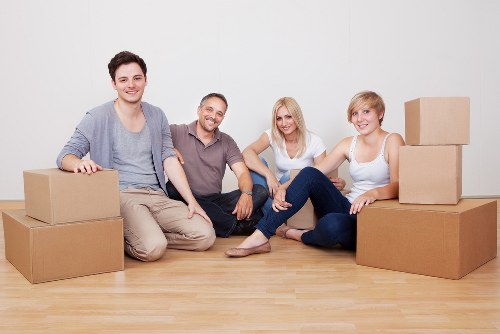 Packed office furniture and boxes ready for relocation in Parsons Green